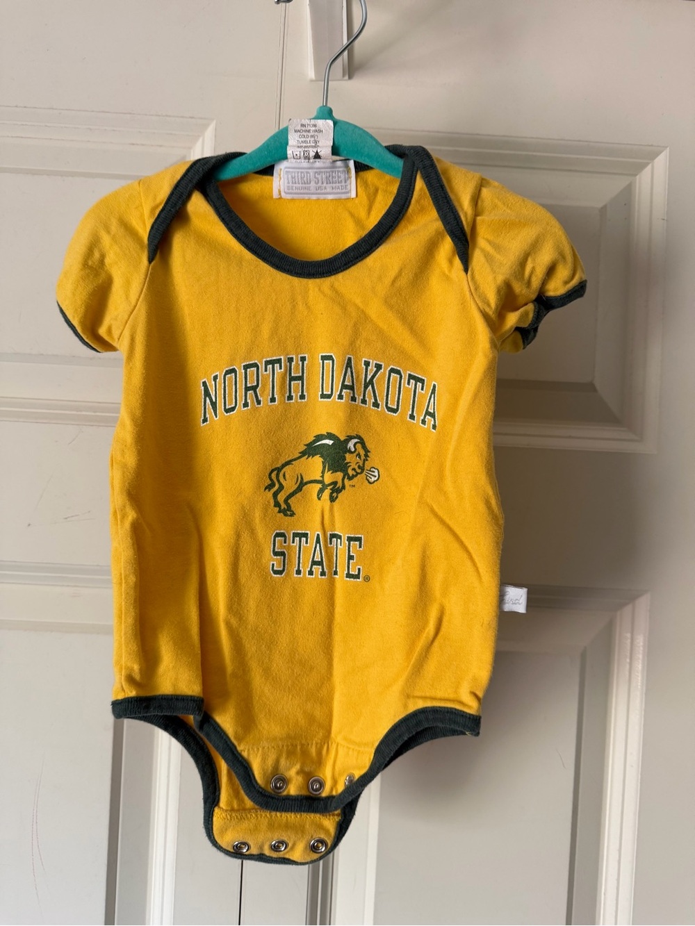 North Dakota State Yellow Baby Bodysuit with Bison Logo